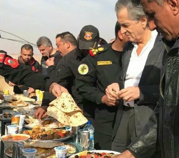 عبد الوهاب الساعدي يأكل مع الصهيوني برنارد ليفي ويبرر!!