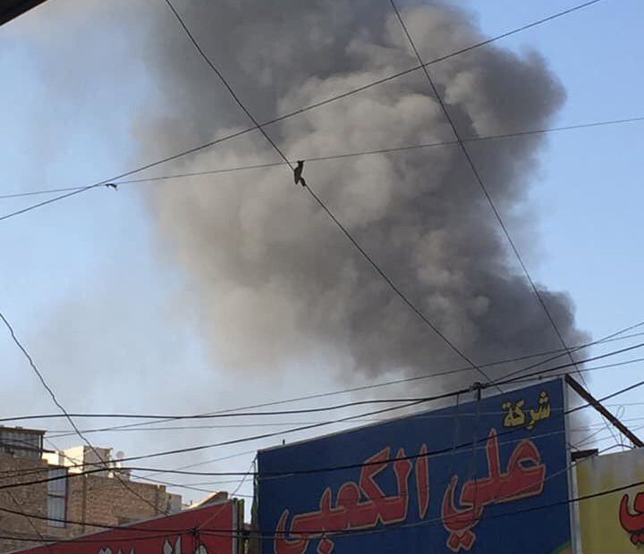 بالصور .... محلات بيع مواد ايرانية تحترق بشارع الرشيد الاحد